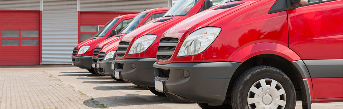 features global-fleet: red delivery vans